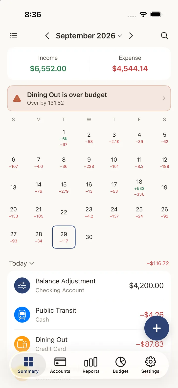 Kiroku monthly summary with income, expense, an over-budget alert and a calendar of daily totals